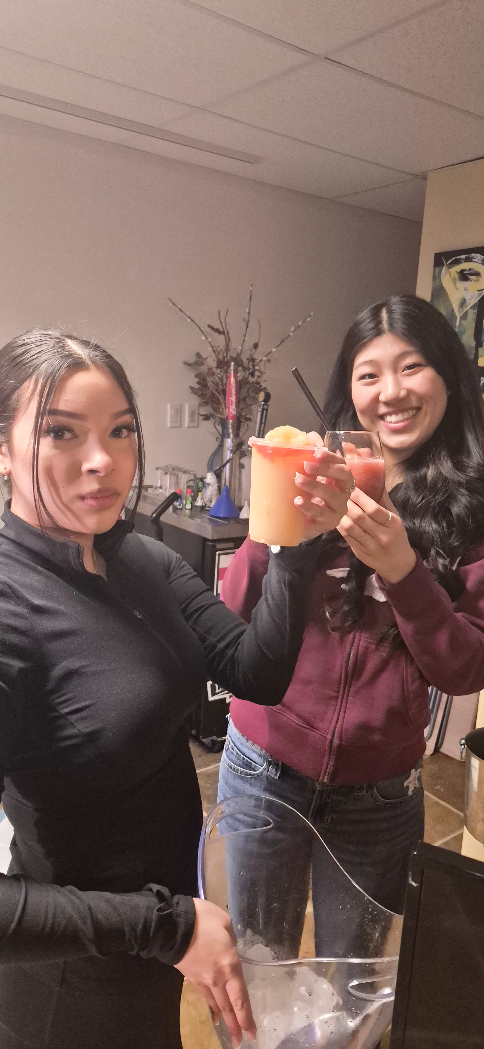 Team members cheersing at event